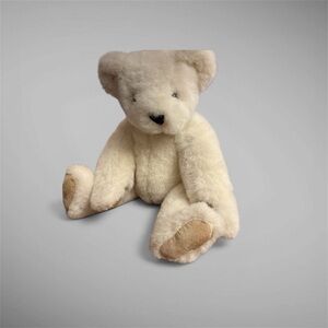 The Vermont Teddy Bear Company white poseable bear with tan paws and black nose
